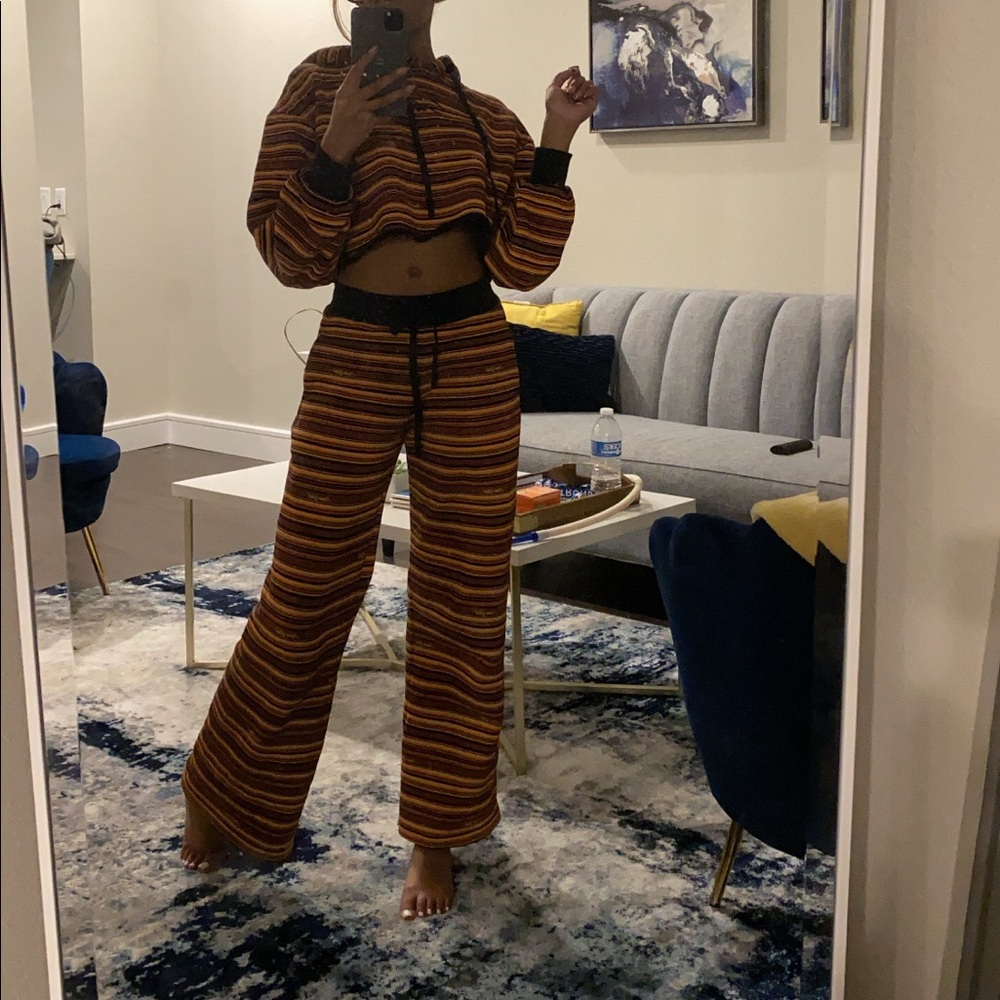 I am Gia sweatsuit. Orange striped